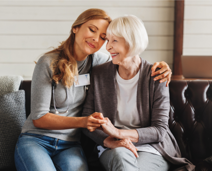 Two ladies helping each other.